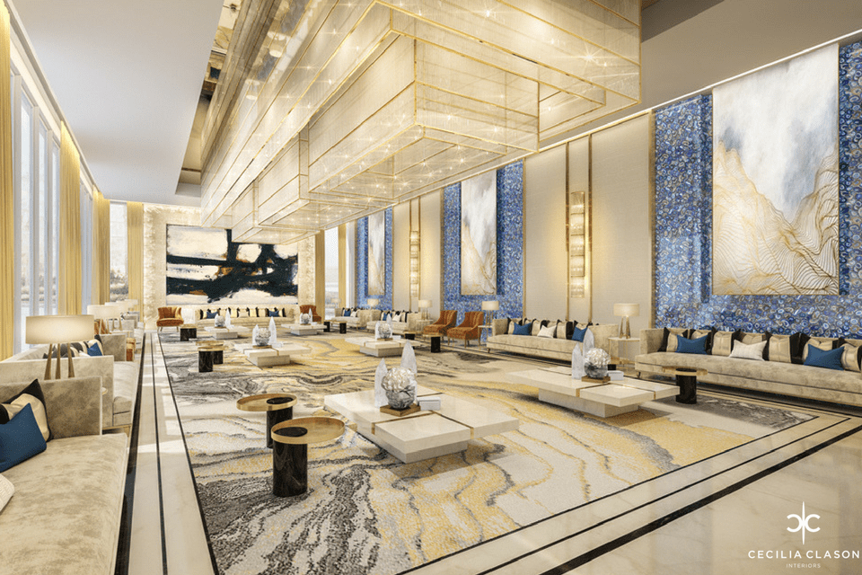 Majlis Design - Neutral golds and blues and luxury furniture on vivid carpet with blue Agate walls in semi-precious stone