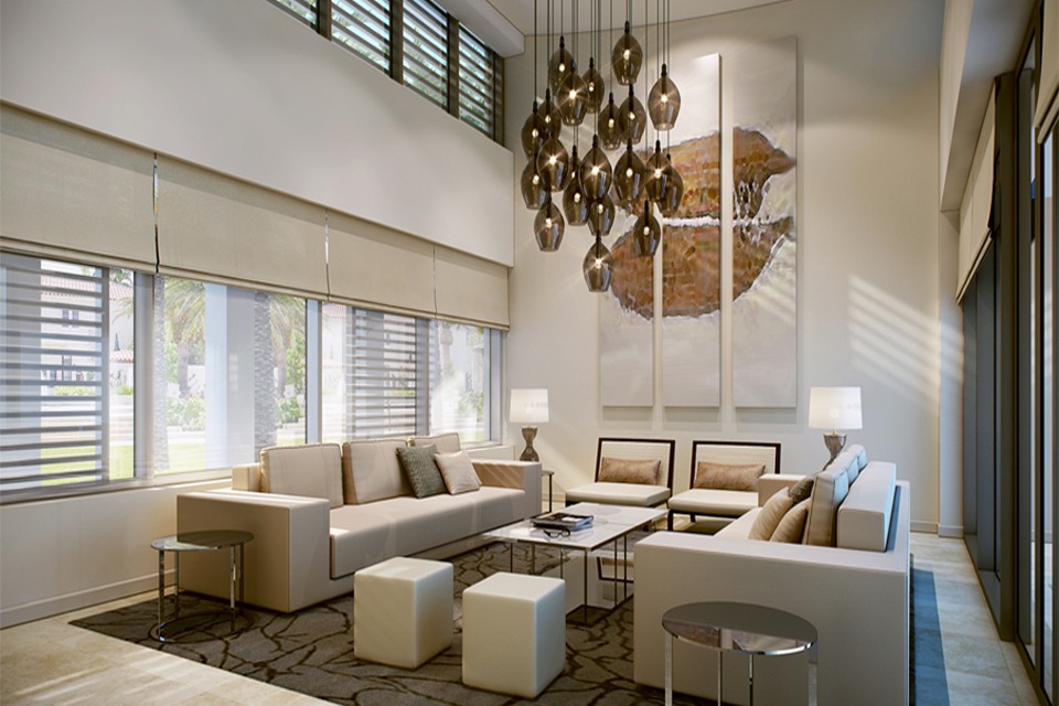 Interior Lounge Design - Cream sofas & chairs on dark textured rug with 3 panel wall art & hanging glass pendant lighting