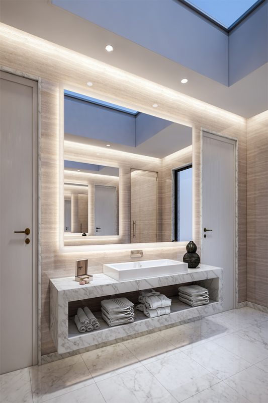 Interior Bathroom Design - Marble bathroom counters above towel storage with marble floor, walls & ceiling lights